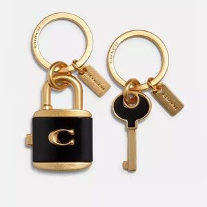 Coach Black and Gold Padlock & Key Keychain Set